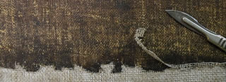 Restoration of rips and tears in canvas