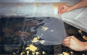 Preservation of a painting - the laying of a protective facing